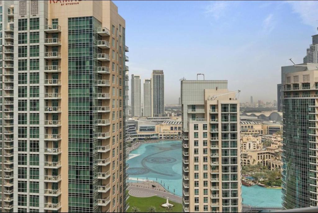 Luxury Burj Khalifa & Fountain View Apartments Steps to Dubai Mall by Simply Comfort